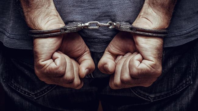 Arrested man in handcuffs