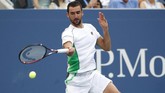 FOTO: Kejutan-kejutan di Babak Keempat AS Terbuka 2018 Hari terakhir babak keempat Amerika Serikat Terbuka 2018 yang berlangsung pada Senin (3/9) menampilkan kejutan dengan kekalahan unggulan kedua Roger Federer.