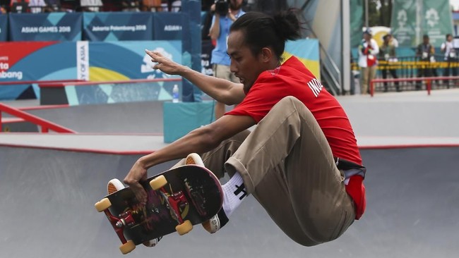 Pevi Permana, peraih medali perunggu Asian Games 2018 punya jalan berliku selama meniti karier, termasuk saat ia sempat menyembunyikan patah tangan.