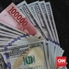 Lembaran mata uang rupiah dan dollar AS diperlihatkan di salah satu jasa penukaran valuta asing di Jakarta, Rabu, 5 September 2018.
