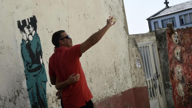 FOTO: Kala Mural Menyelamatkan Kota di Spanyol