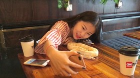 VIDEO: Kafe Reptil, Sensasi Makan Ditemani Reptil di Kamboja