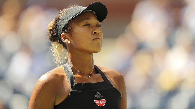 NEW YORK, NY - SEPTEMBER 05: Naomi Osaka of Japan reacts during her women's singles quarter-final match against Lesia Tsurenko of Ukraine on Day Ten of the 2018 US Open at the USTA Billie Jean King National Tennis Center on September 5, 2018 in the Flushing neighborhood of the Queens borough of New York City.   Elsa/Getty Images/AFP