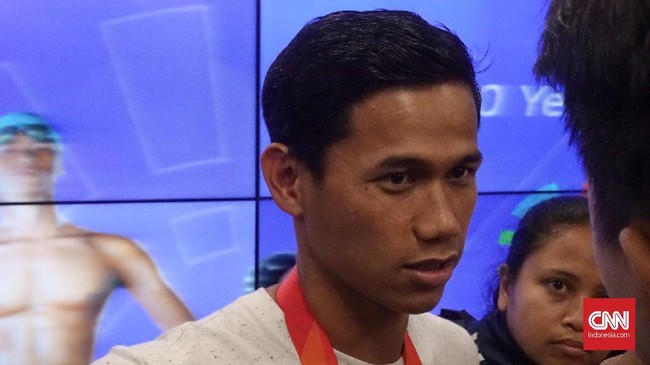Atlet para renang Indonesia Jendi Pangabean sukses meraih medali emas dan mencetak rekor baru di nomor 50 meter kupu-kupu S9 putra di ASEAN Para Games.
