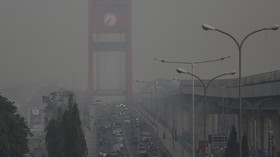 FOTO: Sumatera Selatan Dikurung Kabut Asap