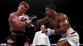 FOTO : Anthony Joshua Menang TKO Atas Alexander Povetkin Juara dunia tinju kelas berat Anthony Joshua berhasil mempertahankan gelar setelah menang TKO atas Alexander Povetkin di Stadion Wembley, Minggu (23/9).