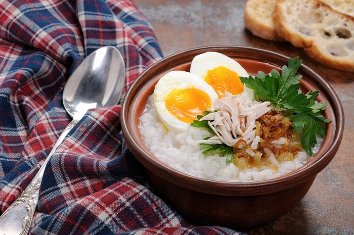 Porridge, scallop & chicken Porridge (congee) served in claypot