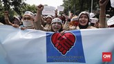FOTO: Aksi Honorer K2 DKI Jakarta Tuntut Status PNS Forum Honorer K2 DKI melakukan aksi di depan Balaikota Jakarta. Hari yang sama, pendaftaran CPNS di situs SSCN yang dikelola BKN sudah bisa diakses masyarakat.