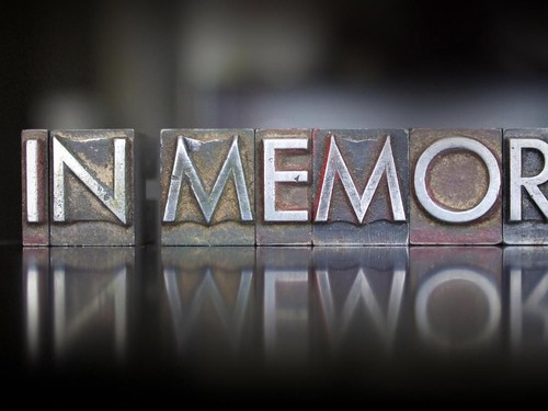 The words In Memory written in vintage letterpress type