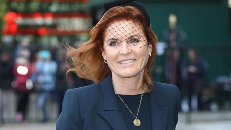 ODIHAM, ENGLAND - MARCH 24:  The Duchess Of York speaks to her Ex-Husband Prince Andrew as they arrive at All Saints Church, Odiham, Hampshire, England for a Thanksgiving Service for Major Ronald Ferguson March 24, 2003. The Major, who died last week, was the ex-Father in Law of H.R.H. Prince Andrew and had been polo manager to H.R.H. Prince Charles.  (Photo by Julian Herbert/Getty Images)