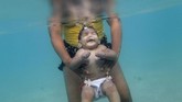 FOTO: Menatap Asa di Balik Bayang-bayang Virus Zika Hampir tiga tahun setelah wabah Zika mengguncang, sejumlah wanita Brasil pelan-pelan menaruh harapannya akan kehidupan yang lebih baik.
