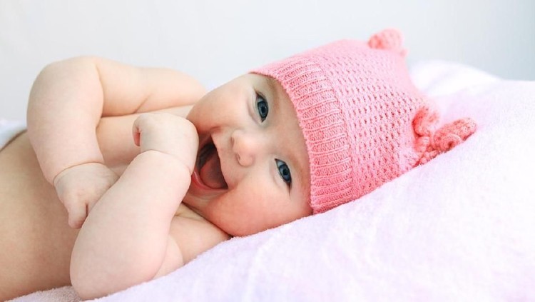 ilustrasi bayi laughing european baby girl with big blue eyes in pink hat