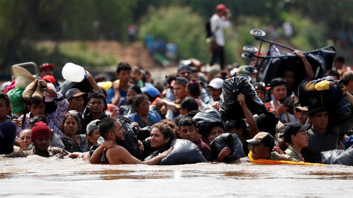 FOTO: Imigran Honduras Pertaruhkan Nyawa Demi Paman Sam