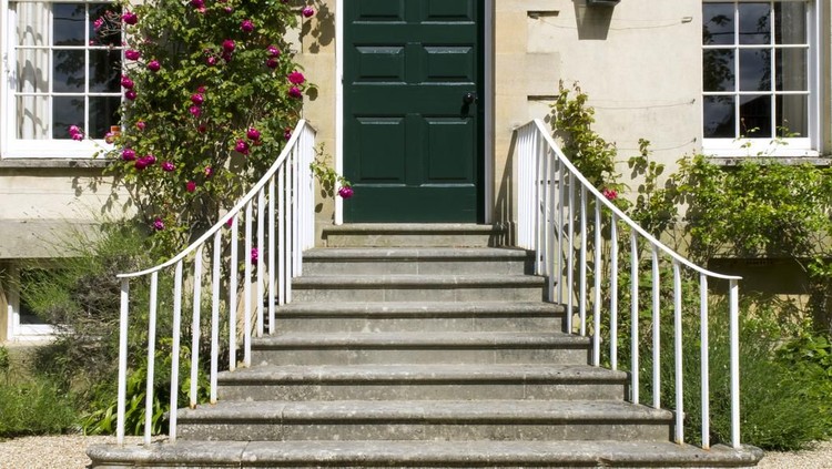 metaphorical welcome image showing a classical door with welcome sign and a red rose - rendering