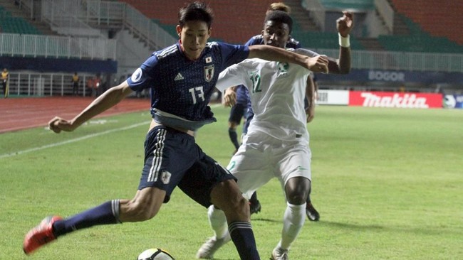 Jepang sukses menggulung Mongolia dengan skor 14-0 dalam pertandingan kualifikasi Piala Dunia Zona Asia, Selasa (30/3) malam.