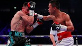 FOTO: Daud Yordan Dikalahkan Petinju Tuan Rumah Inggris Daud Yordan gagal mewujudkan ambisi menantang juara bertahan Vasyl Lomancheko usai dikalahkan petinju tuan rumah Inggris, Anthony Crolla, Sabtu (10/11).
