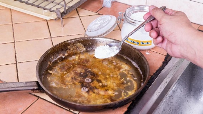 Wash a dirty pot