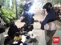 'Sambil Menyelam Minum Air', Mencari Rezeki di Aksi Reuni 212