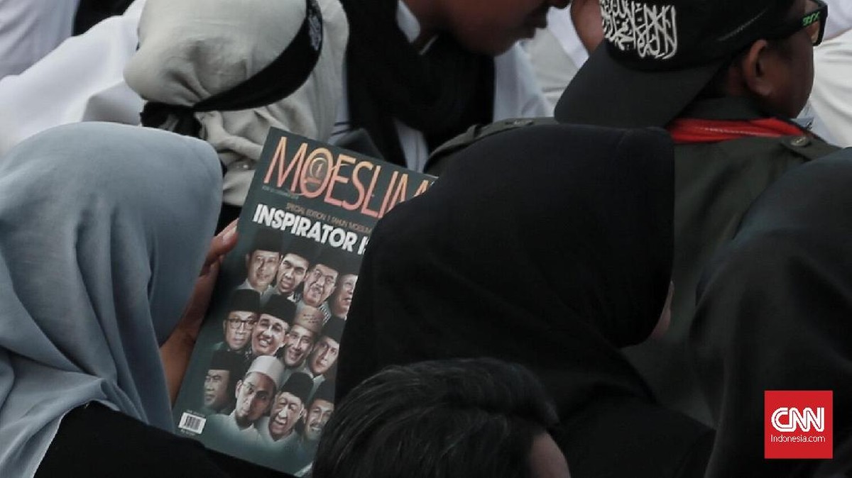 FOTO: Reuni 212 Diwarnai Bendera Tauhid dan Ganti Presiden