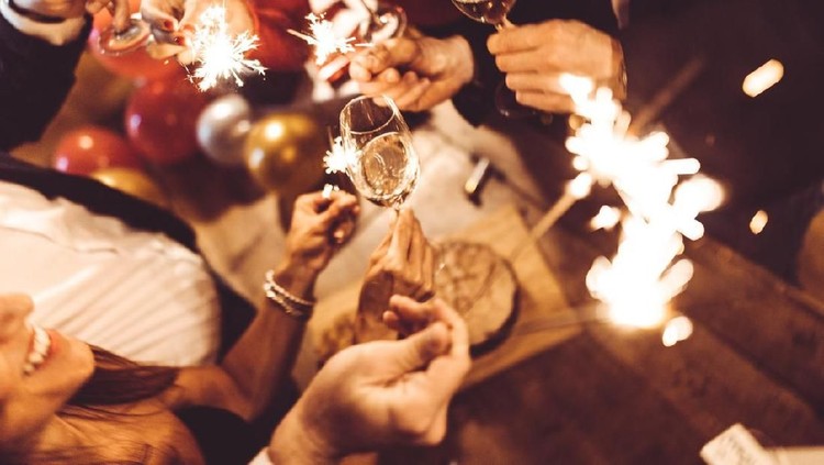 Happy friends celebrating the New Year.