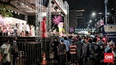 FOTO: Semarak Tahun Baru 2019 di Ibu Kota Hujan dan angin kencang mewarnai perayaan Tahun Baru 2019 di sejumlah titik di Jakarta. Namun warga tetap antusias menyambut pergantian tahun.