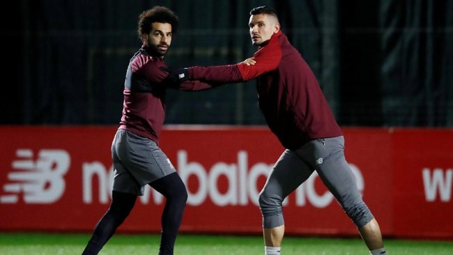 Bek Liverpool Dejan Lovren mengungkapkan isi pesan WhatsApp kocak Mohamed Salah yang lupa waktu latihan jelang laga penting melawan Manchester City.