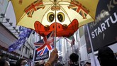 NYALANG: Pada Suatu Mula yang Kelabu Dalam foto-foto unik pilihan CNNIndonesia.com pekan ini, ada kisah perayaan tahun baru dari berbagai negara, musim dingin di India, dan para imigran Meksiko.