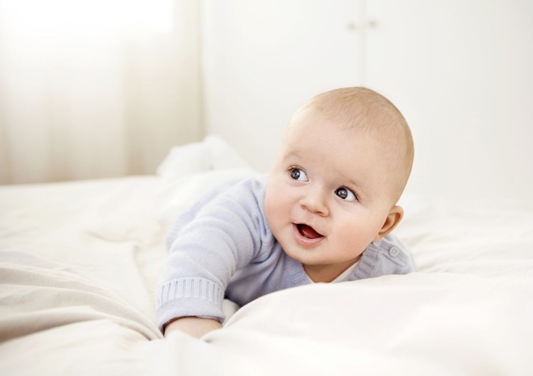 Adorable and happy baby boy.