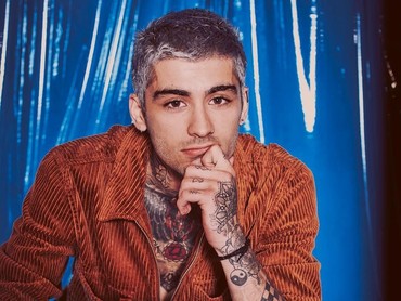 img-title Dicibir karena Orang Asia, Zayn Malik Dapat Perlakuan Rasis Saat Bersama One Direction