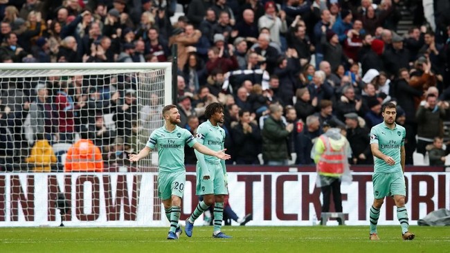 Arsenal takluk 0-1 di markas West Ham United dalam lanjutan Liga Primer Inggris yang dihelat di Stadion London, Sabtu (12/1).