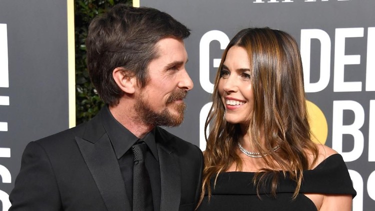 LOS ANGELES, CA - JANUARY 06:  Christian Bale (R) and Sibi Blazic attend FIJI Water at the 76th Annual Golden Globe Awards Celebration on January 6, 2019 in Los Angeles, California.  (Photo by Gabriel Olsen/Getty Images for FIJI Water)