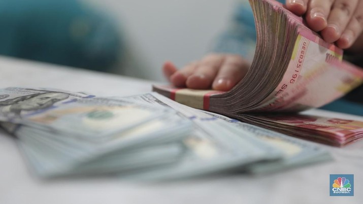 Pukul 13.00 WIB: Rupiah Tertahan di Rp 13.710/US$