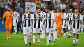 FOTO: Trofi Pertama Ronaldo di Juventus Cristiano Ronaldo merebut trofi pertamanya di Juventus setelah menang 1-0 atas AC Milan di Piala Super Italia 2018.