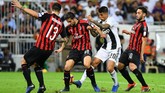 FOTO: Trofi Pertama Ronaldo di Juventus Cristiano Ronaldo merebut trofi pertamanya di Juventus setelah menang 1-0 atas AC Milan di Piala Super Italia 2018.