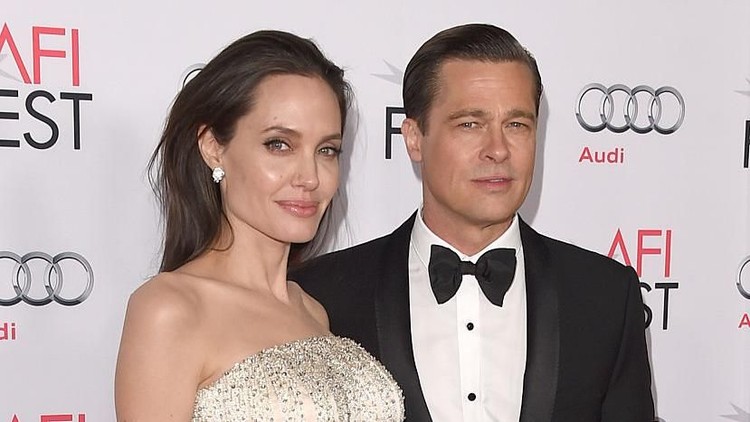HOLLYWOOD, CA - NOVEMBER 05:  Writer-director-producer-actress Angelina Jolie Pitt (L) and actor-producer Brad Pitt attend the opening night gala premiere of Universal Pictures' 'By the Sea' during AFI FEST 2015 presented by Audi at TCL Chinese 6 Theatres on November 5, 2015 in Hollywood, California.  (Photo by Jason Merritt/Getty Images)
