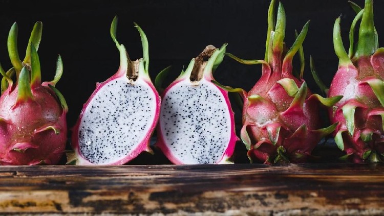 Dragon fruit smoothie on wooden table.food healthy