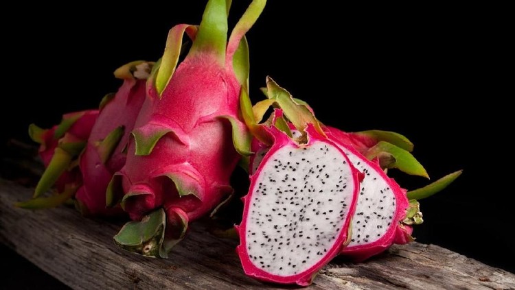 Dragon fruit smoothie on wooden table.food healthy