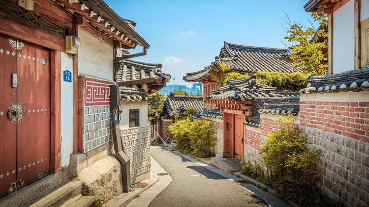 Seoul, South Korea - June 14, 2017: Many people visiting Bukchon Hanok village in South Korea. The traditional Korean architecture can be at this place.
