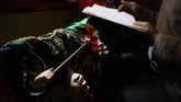 FOTO: Pentas Wayang Potehi Menembus Batas Zaman Pementasan Wayang Potehi biasanya menjamur di awal tahun menjelang perayaan Imlek atau Tahun Baru China.