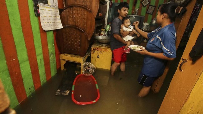 FOTO: Kelabu Jakarta di Puncak Musim Hujan