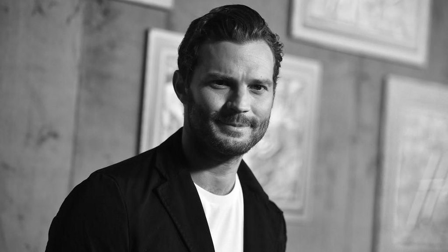 HOLLYWOOD, CA - OCTOBER 04:  (Editors Note: This image was converted to black & white using digital filters.) Jamie Dornan attends the premiere of HBO Films' 