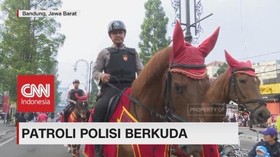 Patroli Polisi Berkuda Mengundang Perhatian Warga