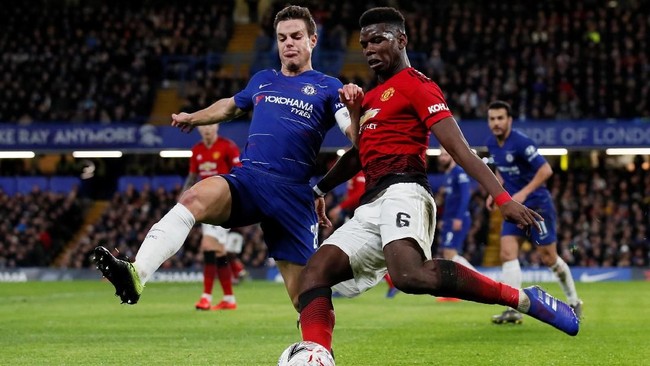Manchester United melaju ke babak perempat final Piala FA setelah mengalahkan Chelsea 2-0 di Stadion Stamford Bridge, Senin (18/2) waktu setempat.