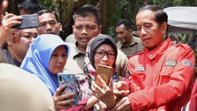 Awali Pidato, Jokowi Kenang Masa Kecil hingga Peran Istri