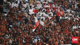 Pakai Loreng Oranye, Jokowi Hadir di Acara Pemuda Pancasila