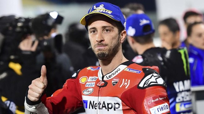 Mission Winnow Ducati's rider Andrea Dovizioso celebrates the second position at the end of the qualification session at Losail track in Doha on March 9, 2019 ahead of the season's start at Qatar MotoGP grand prix on March 10. (Photo by GIUSEPPE CACACE / AFP)