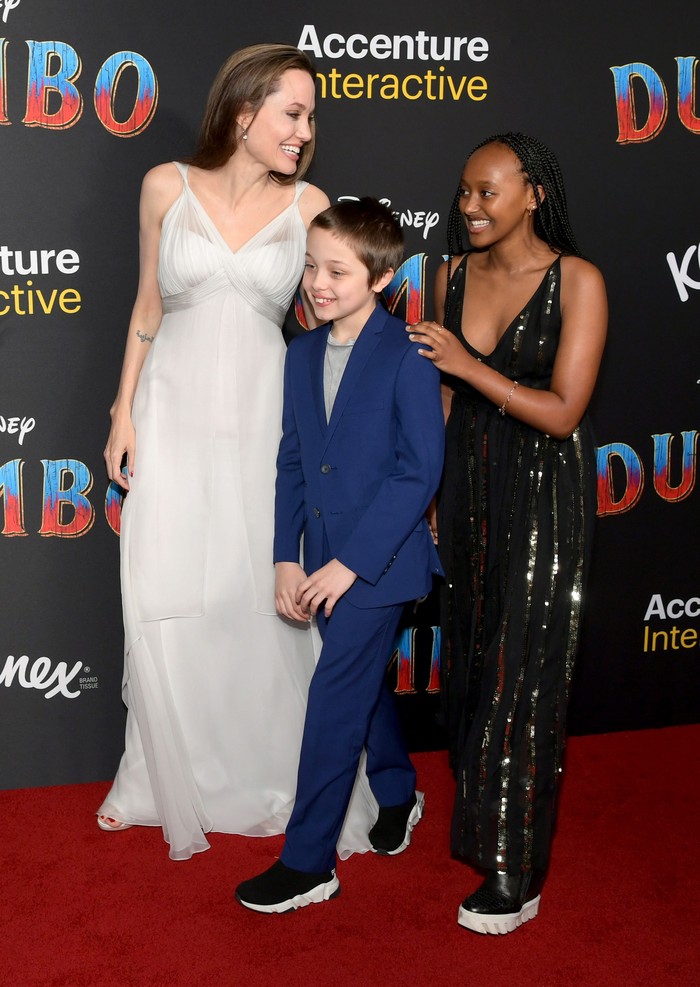 LOS ANGELES, CALIFORNIA - MARCH 11: Angelina Jolie with her children Knox Jolie-Pitt and Zahara Marley Jolie-Pitt attend the premiere of Disney's 