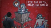 FOTO : Mural Pemilu 2019 dan Upaya Mengikis Golput KPU menggandeng masyarakat untuk mensosialisasikan Pemilu 2019 melalui Mural. Tujuannya, untuk meningkatkan partisipasi pemilih pada Pemilu 17 April mendatang.