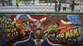 FOTO : Mural Pemilu 2019 dan Upaya Mengikis Golput KPU menggandeng masyarakat untuk mensosialisasikan Pemilu 2019 melalui Mural. Tujuannya, untuk meningkatkan partisipasi pemilih pada Pemilu 17 April mendatang.