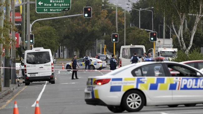 Police block the road near the shooting at a mosque in Linwood, Christchurch, New Zealand, Friday, March 15, 2019. Multiple people were killed during shootings at two mosques full of people attending Friday prayers. (AP Photo/Mark Baker)